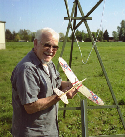 Frank Macy holds one of his Army Interceptors in preparation to use the military launcher